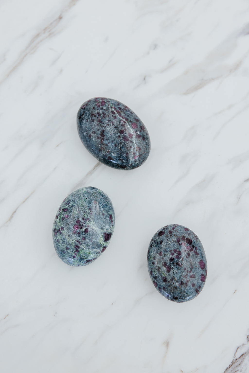 Wings Hawaii Ruby Kyanite palm stones for meditation, soothing sensory tools or home decor. 