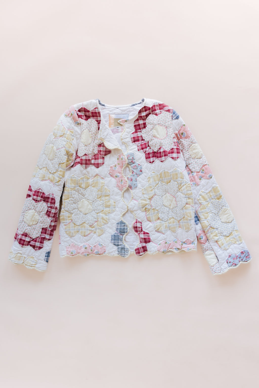 Wings Hawaii vintage quilt jacket. Upcycled, sustainable, small batch, creative fashion handmade in Maui. 