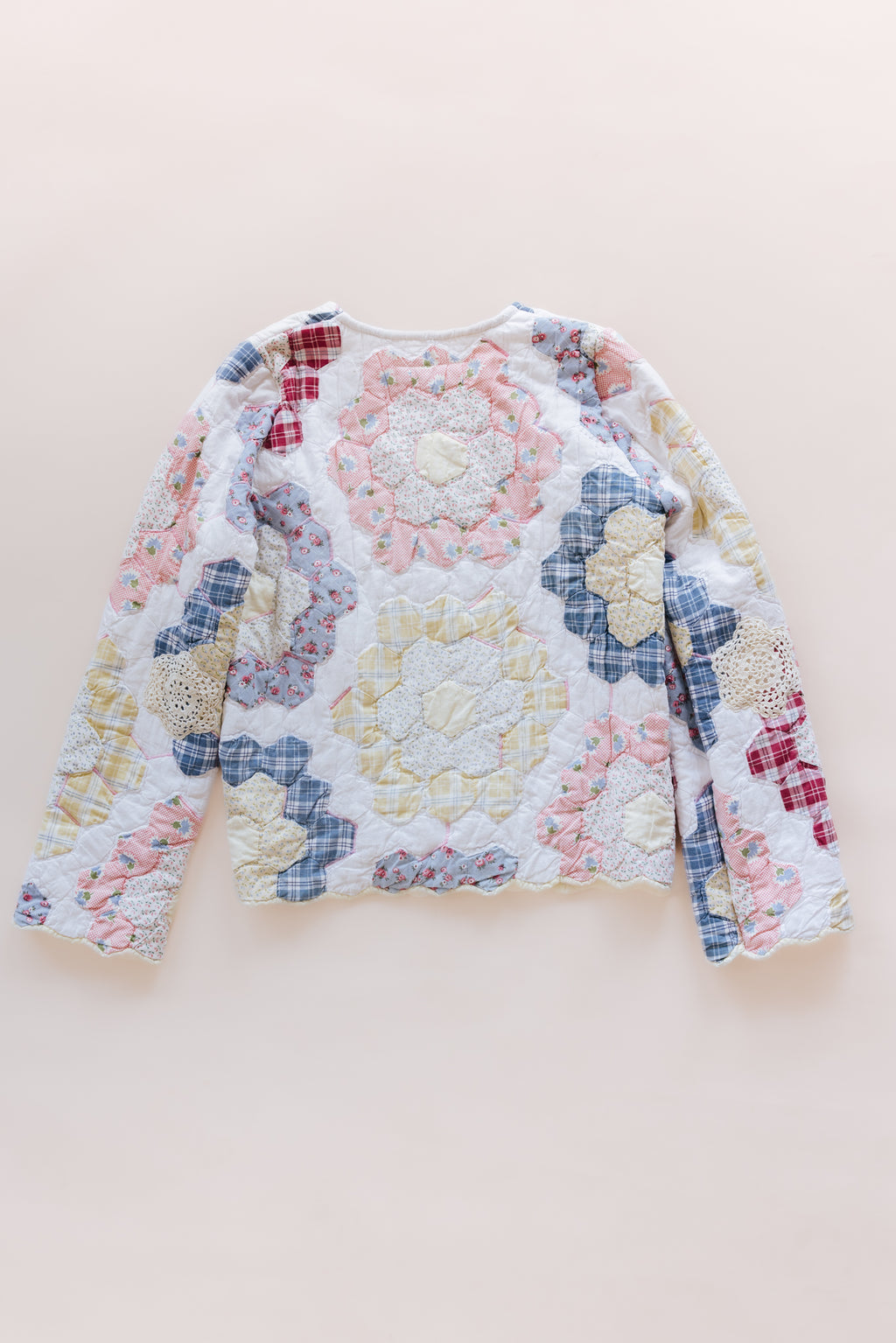 Wings Hawaii vintage quilt jacket. Upcycled, sustainable, small batch, creative fashion handmade in Maui. 