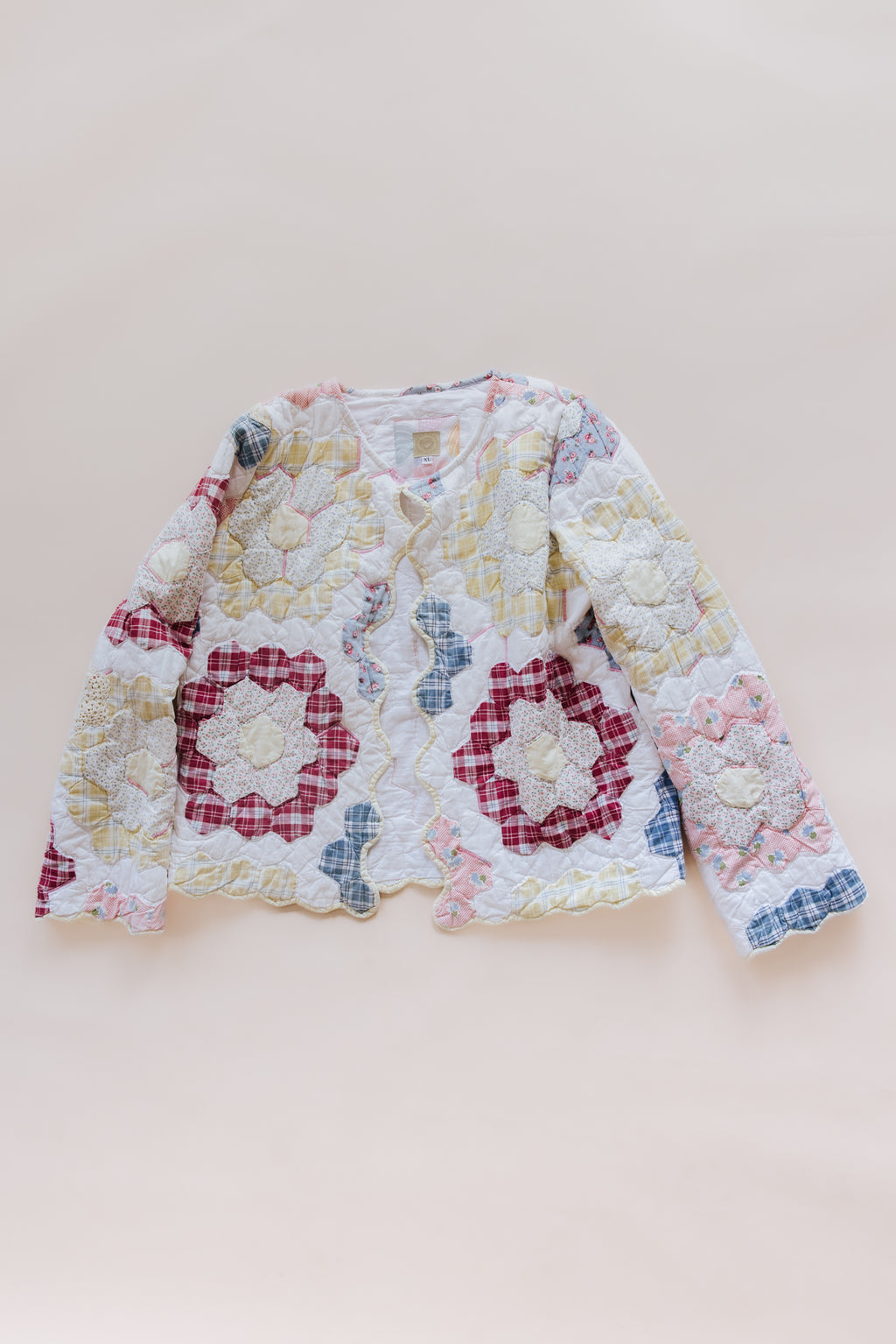 Wings Hawaii vintage quilt jacket. Upcycled, sustainable, small batch, creative fashion handmade in Maui. 