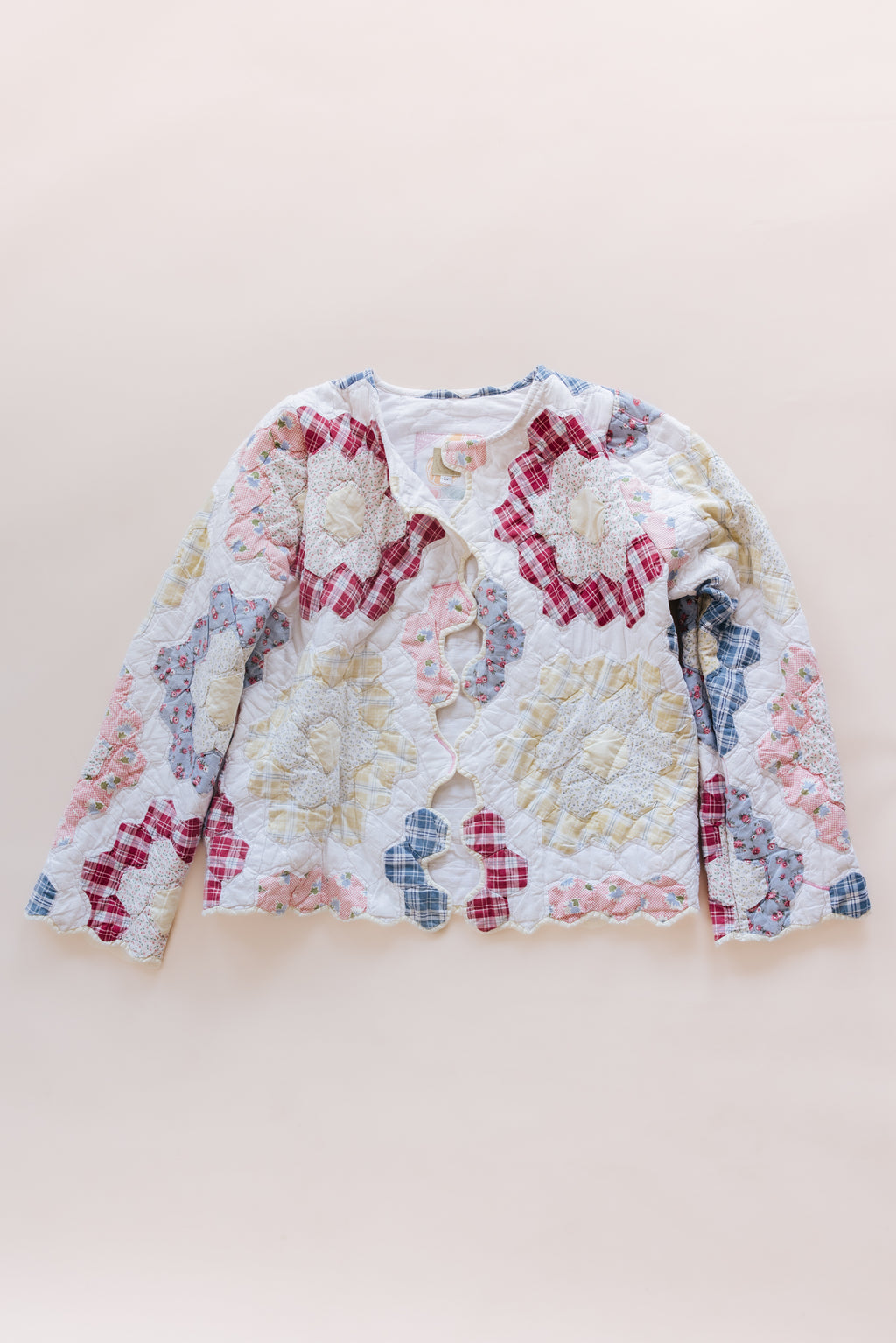 Wings Hawaii vintage quilt jacket. Upcycled, sustainable, small batch, creative fashion handmade in Maui. 