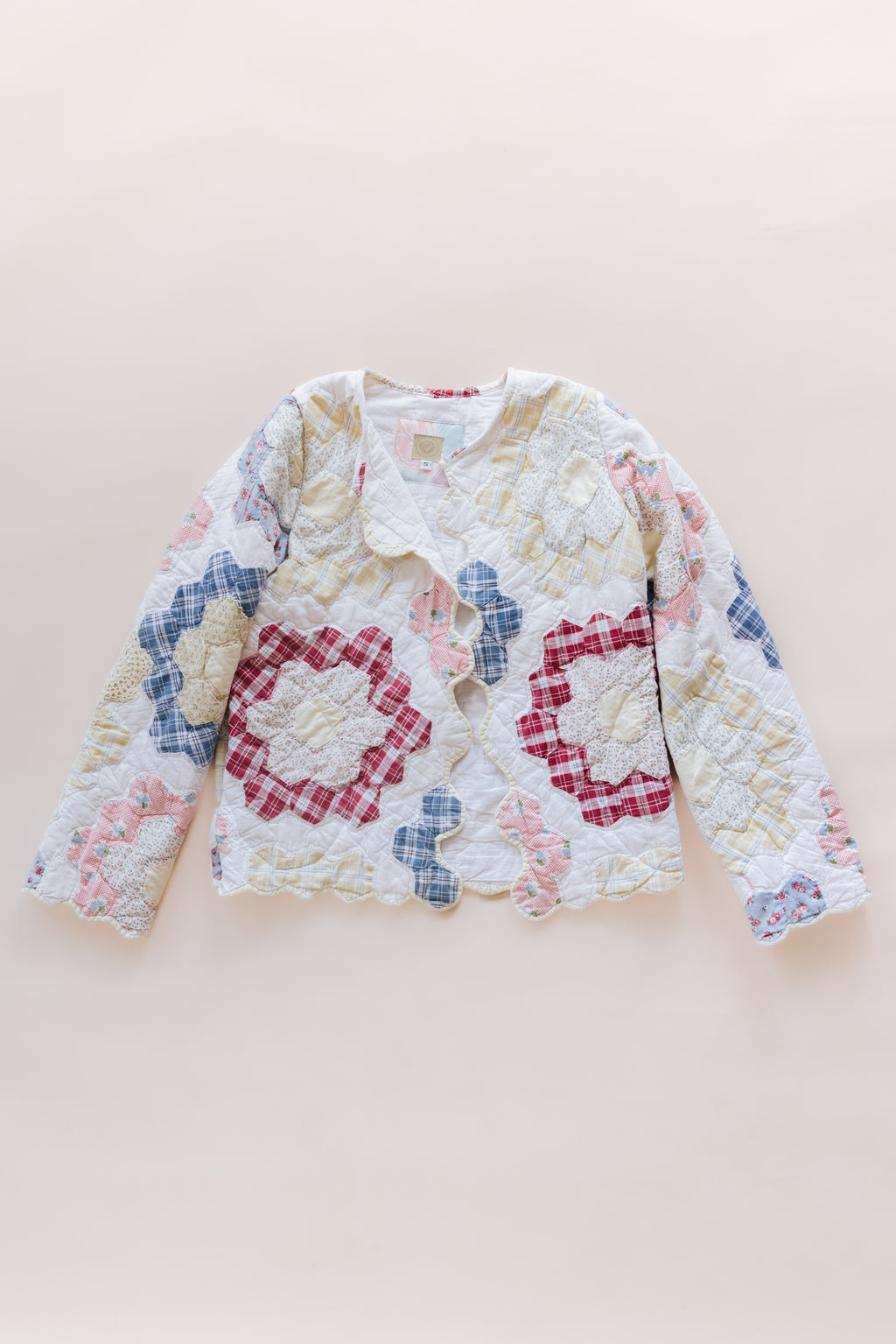 Wings Hawaii vintage quilt jacket. Upcycled, sustainable, small batch, creative fashion handmade in Maui. 