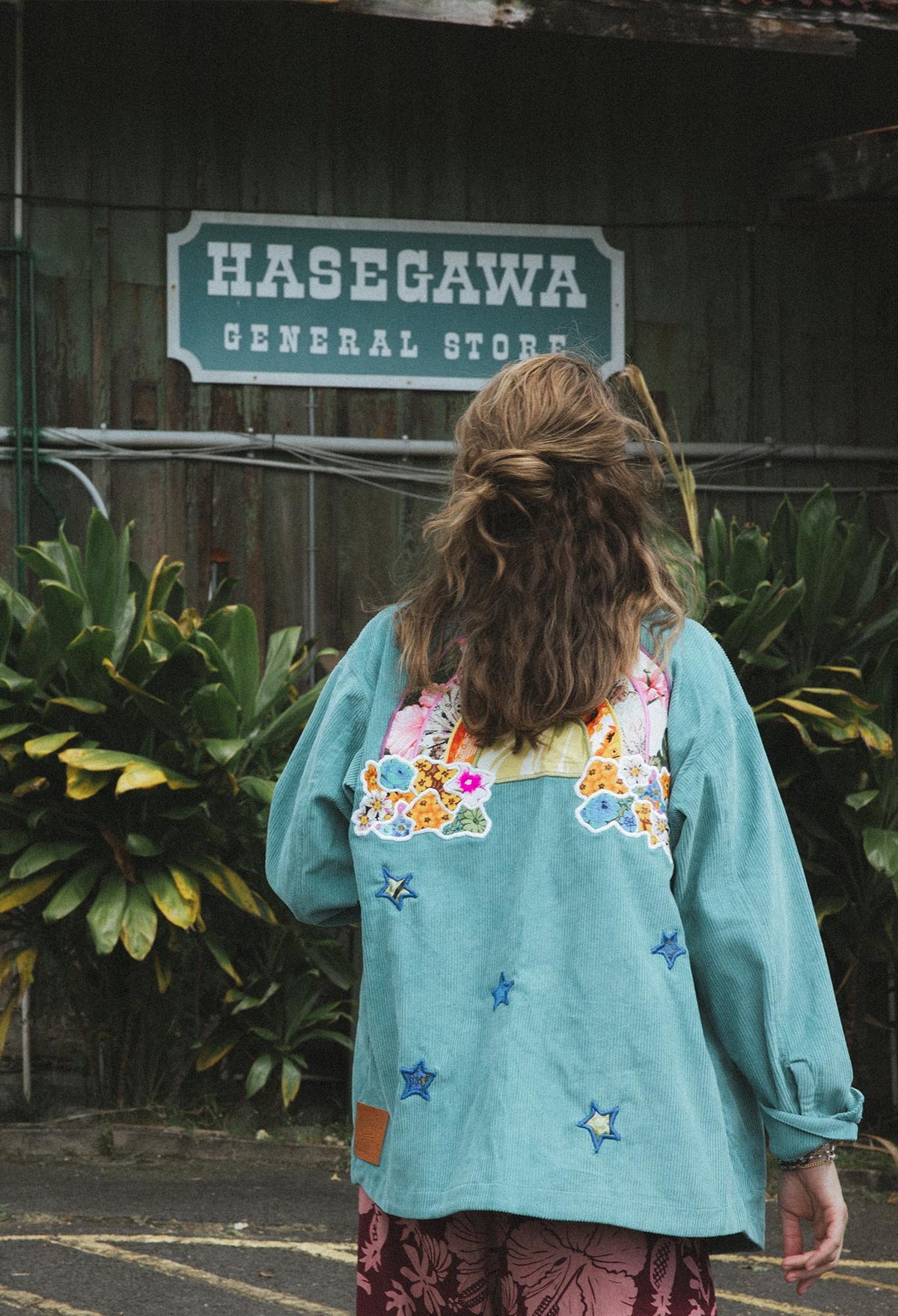 Wings Hawaii Rainbow Field Jacket. Teal blue oversized corduroy jacket with rainbow design in upcycled aloha fabric. Handmade and hand-sewn in Haiku, Maui. Perfect beach coverup or winter layer. One of a kind. 
