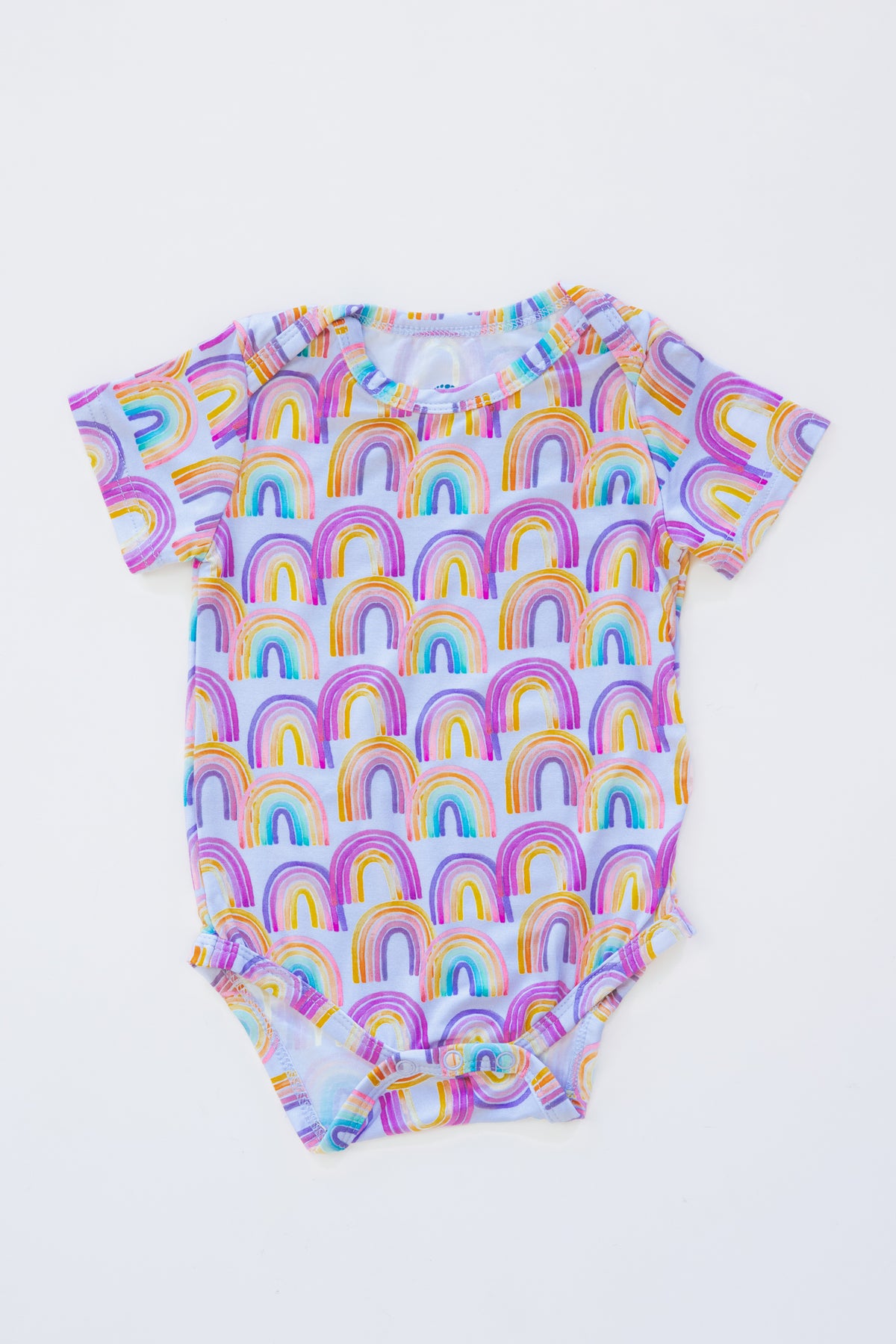 Wings Hawaii baby onesie with rainbows print. Original artwork designed in Maui. Island-inspired keiki apparel and gifts. Best baby shower gifts with aloha from Hawaii. 