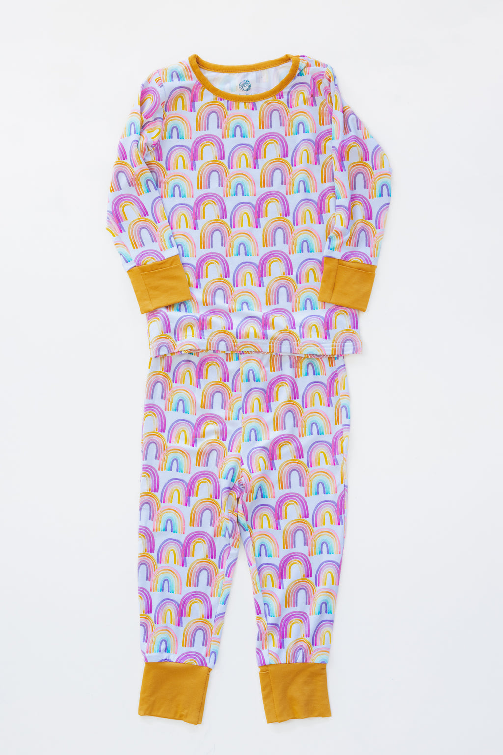 Wings Hawaii Rainbow kids pajamas set. Original artwork designed in Maui. Island style keiki gifts. Long sleeved shirt with pajama pants. Small batch, sustainable, unique children’s apparel. 