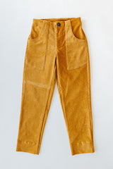 Model wearing Wings Hawaii retro pocket pants in marigold corduroy - front thumbnail
