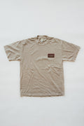Wings Hawaii men's Rooster t-shirt in mushroom light brown. 1981 design on front, rooster print on back. Original artwork designed in Maui. Men's small batch, sustainable apparel from Hawaii. Cool, unique Maui souvenir for guys. 