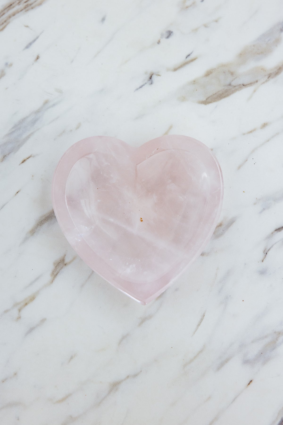 Wings Hawaii rose quartz heart shaped bowls. Unique crystal gemstone gifts from Maui. 