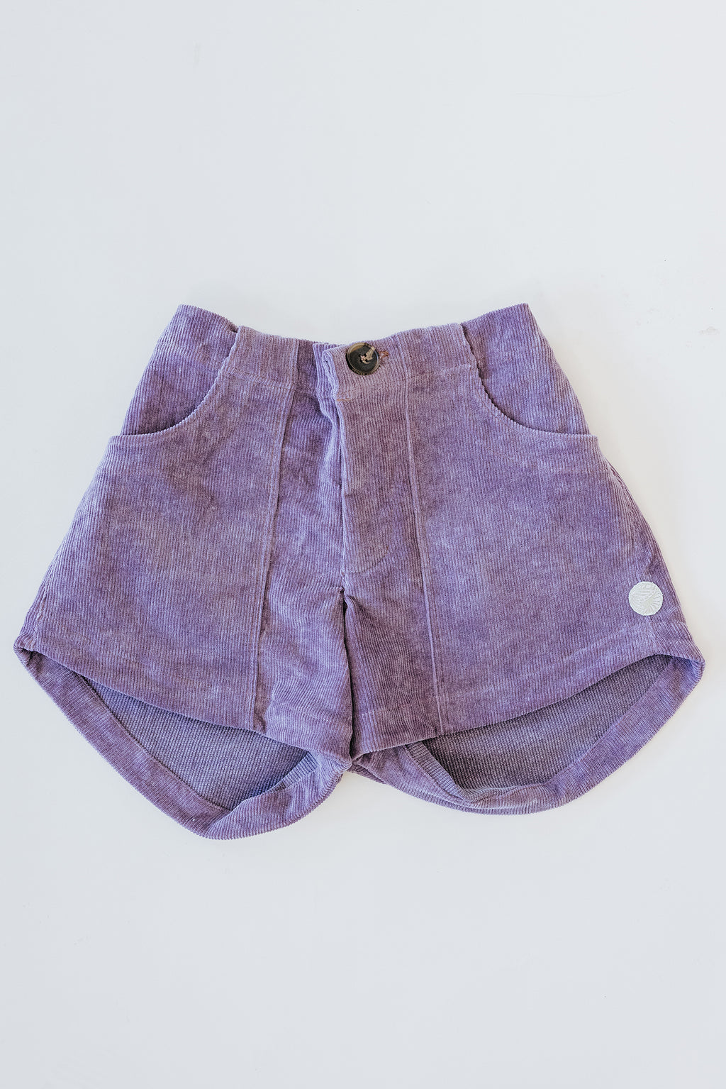 Wings Hawaii retro pocket shorts in lilac corduroy. Designed with aloha in Maui. Sustainable, small batch, women's apparel handcrafted for an island lifestyle. 