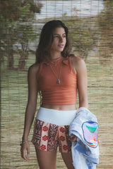 Wings Hawaii Ribbed Lexi Tank Top. Stretchy high neck cropped muscle tank top in Rust orange. Designed in Maui, sewn in Bali. Sustainable, small batch, boho beachy chic women's apparel.  thumbnail