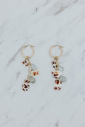 Wings Hawaii shell pile charm hoop earrings with real Hawaiian sea shells and aquamarine beads in 14k gold-filled. Fine jewelry gifts handmade in Maui. 