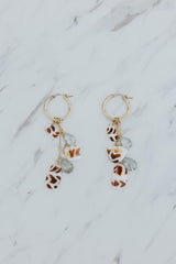 Wings Hawaii shell pile charm hoop earrings with real Hawaiian sea shells and aquamarine beads in 14k gold-filled. Fine jewelry gifts handmade in Maui.  thumbnail