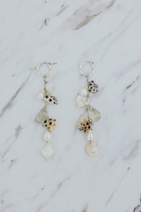 Wings Hawaii Shell Pile Charm Hoops earrings in sterling silver with real Hawaiian beach shells, pearls, and aquamarine beads. Fine jewelry handmade in Maui. 