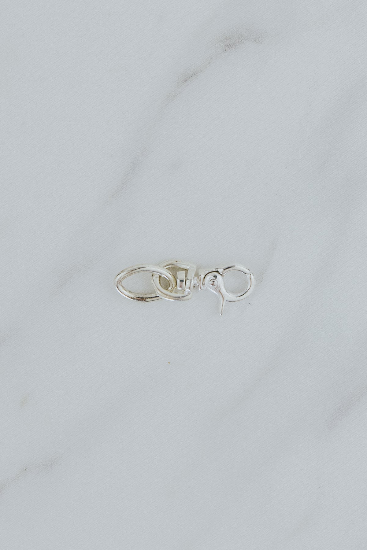 Wings Hawaii Swivel Clasp Connector in Sterling Silver. Use to extend necklaces or customize charm jewelry. Fine jewelry handcrafted in Maui. 