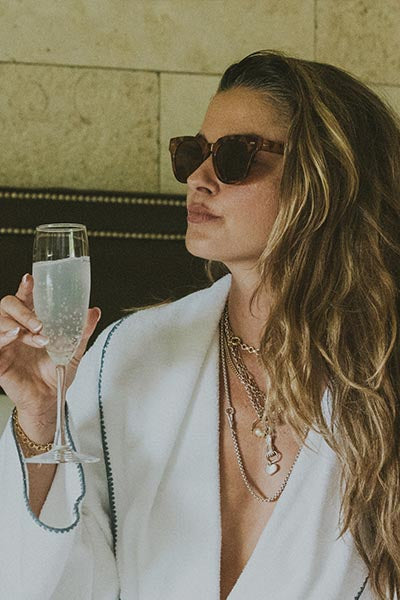 Model wearing Wings Hawaii Venetian Chain Necklace layered with others