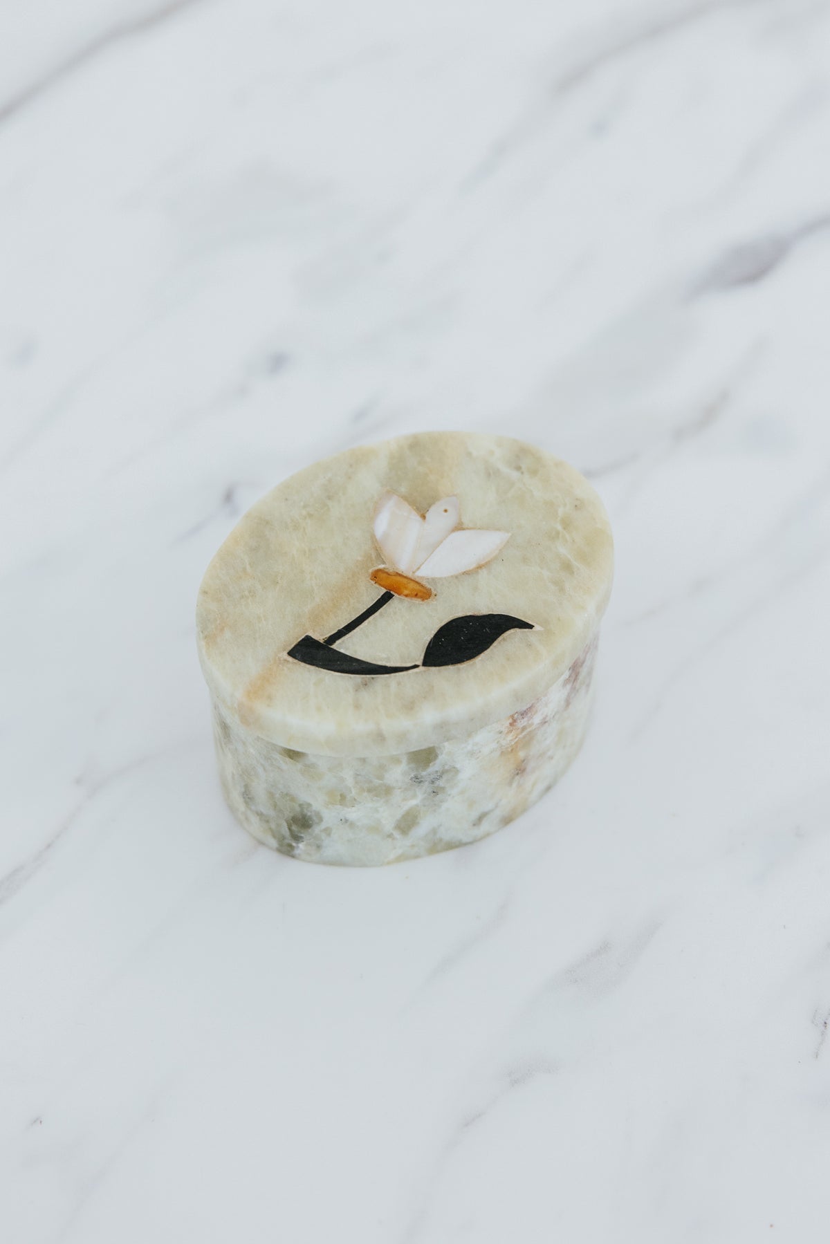Wings Hawaii stone jewelry boxes with floral inlay design. Great gifts and souvenirs from Paia, Maui. 