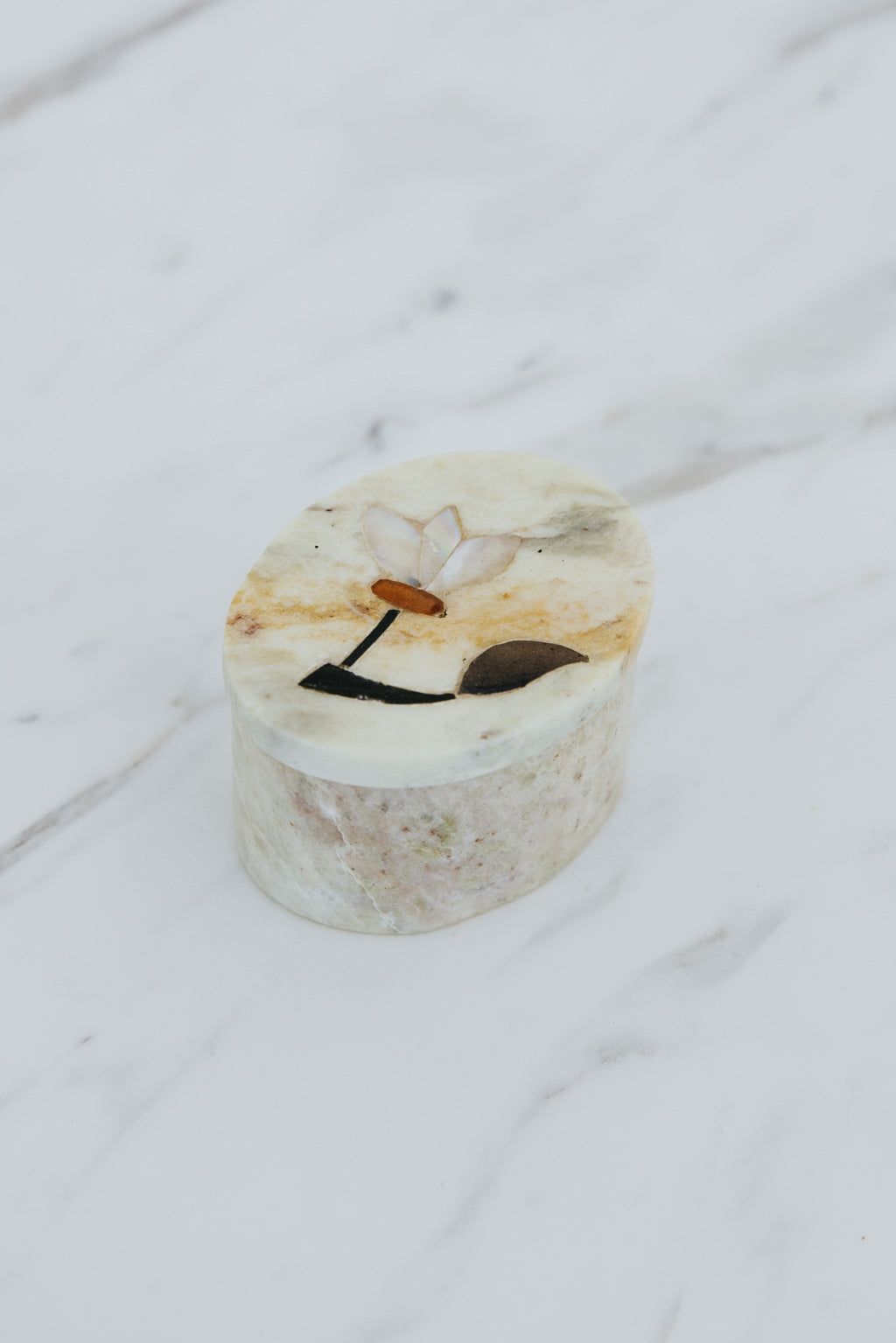 Wings Hawaii stone jewelry boxes with floral inlay design. Great gifts and souvenirs from Paia, Maui. 
