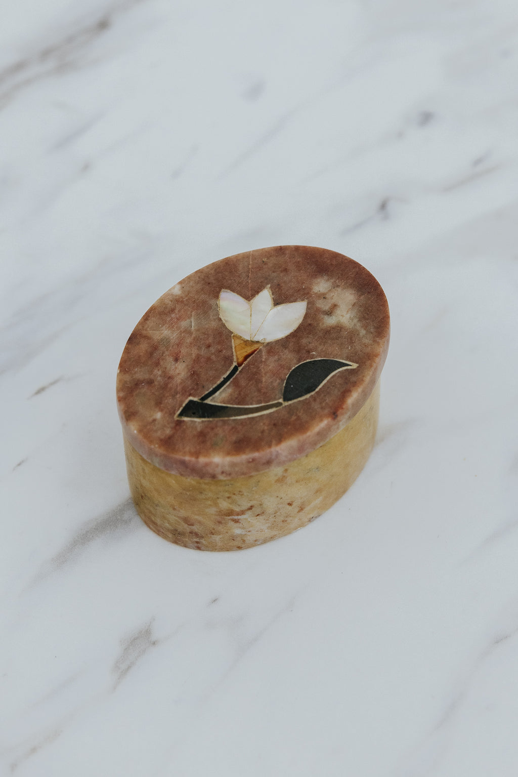 Wings Hawaii stone jewelry boxes with floral inlay design. Great gifts and souvenirs from Paia, Maui. 