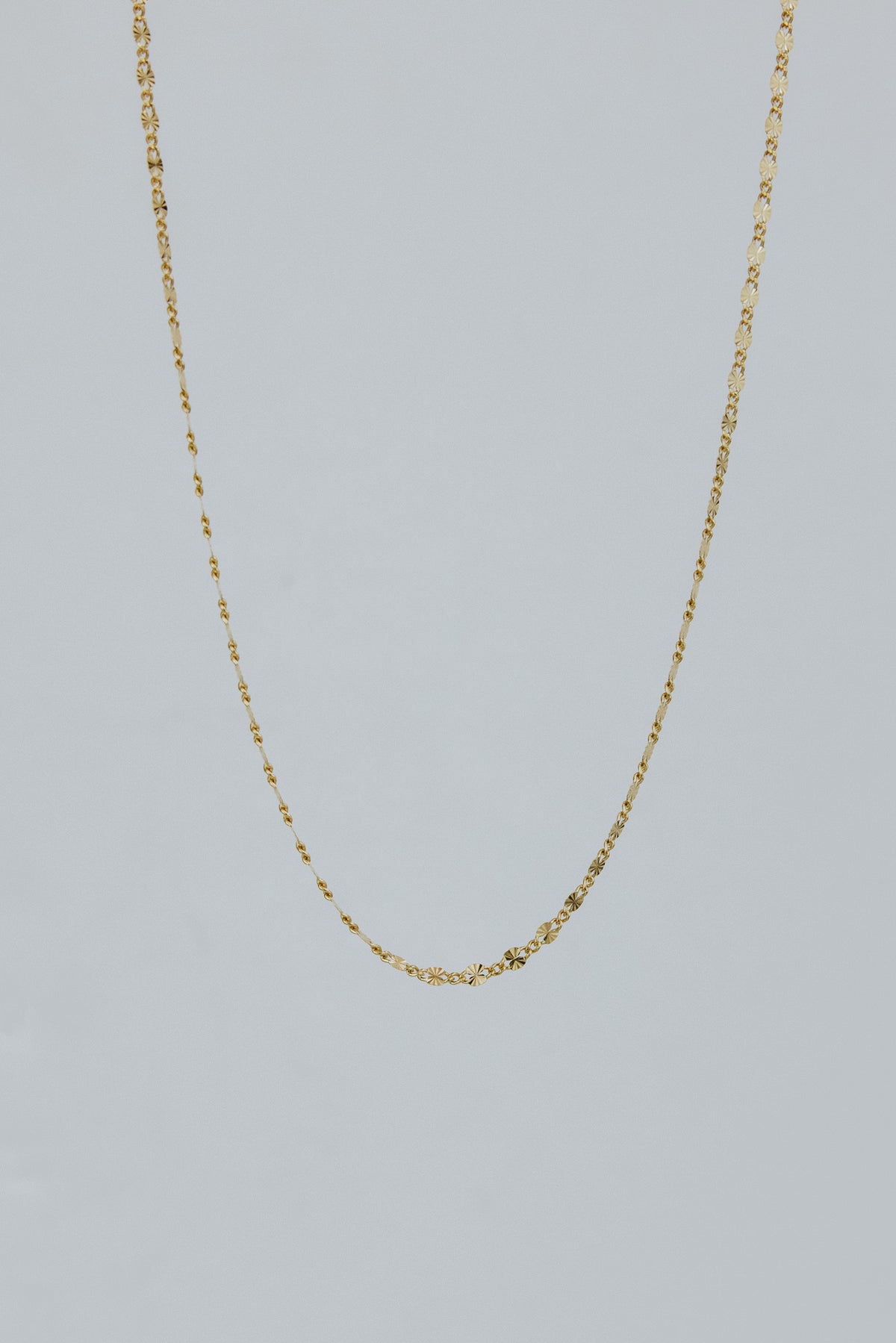 Wings Hawaii Sunburst chain necklaces in 14k gold-filled. 15" or 16" lengths. Fine jewelry handcrafted in Maui. Wear solo or add charms or a fob extender. 