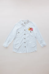 Wings Hawaii sun + moon linen blouse in white. Long sleeve shirt with side pockets. Handmade and upcycled with vintage aloha fabrics. Handcrafted in Maui with aloha. Small batch, sustainable, high quality women's apparel made in Hawaii.  thumbnail