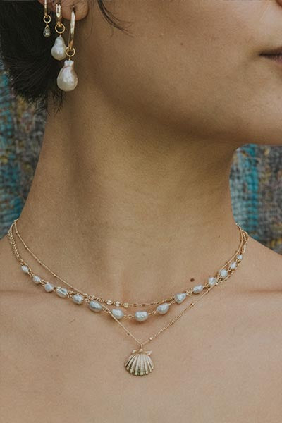 Wings Hawaii Forever Sunrise Shell Necklace in sterling silver or 14k yellow gold. Fine jewelry handmade in Maui. 