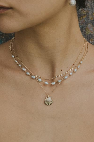 Wings Hawaii Forever Sunrise Shell Necklace in sterling silver or 14k yellow gold. Fine jewelry handmade in Maui. 