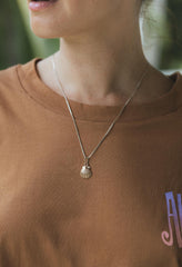 Wings Hawaii Forever Sunrise Shell Necklace Charm in sterling silver, solid 14k yellow gold, or solid 14k rose gold. Fine jewelry handmade in Maui. 