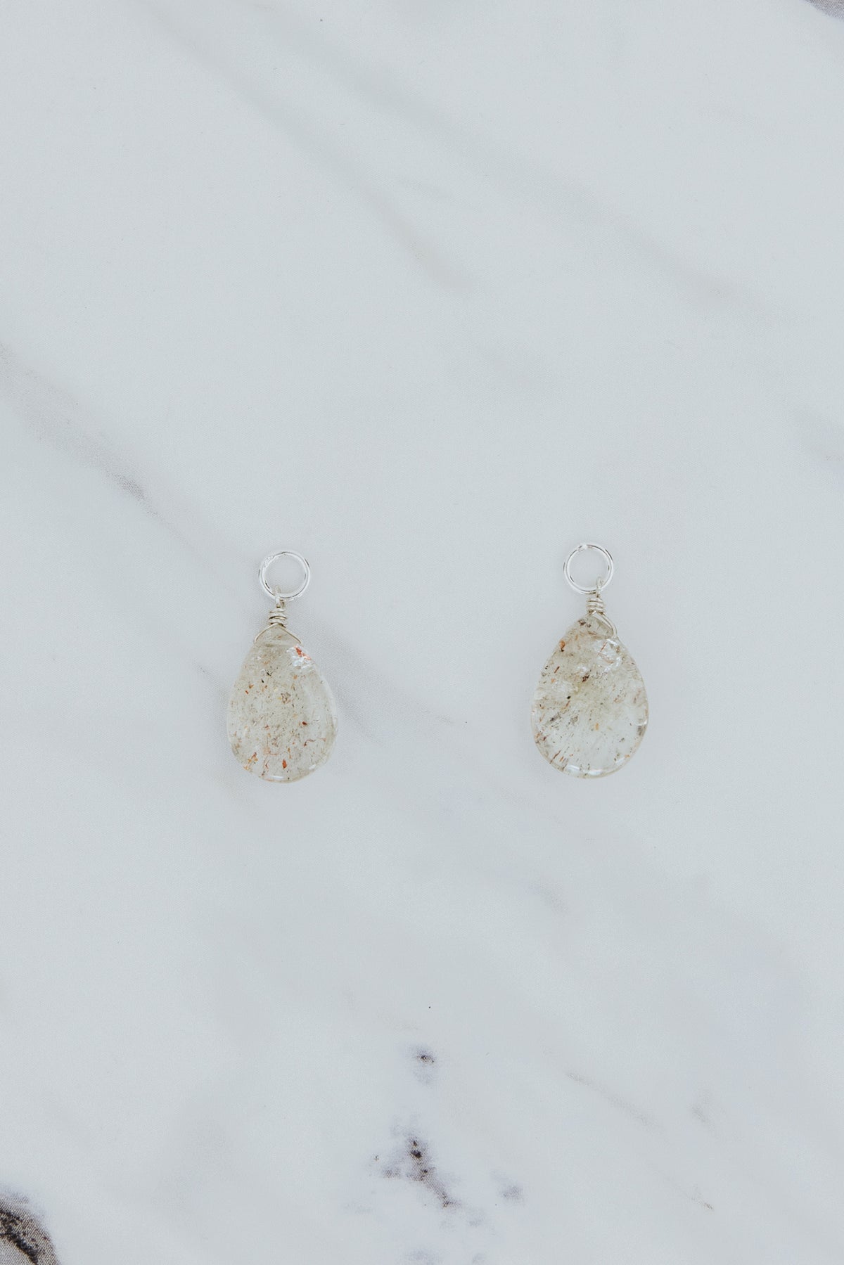 Wings Hawaii sunstone gemstone earring charms in sterling silver. Fine jewelry handmade in Maui. Charm Bar mix match create your own luxury charm hoop earrings. 