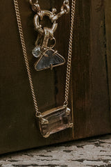 A lovely emerald-cut pink Sunstone, prong set on solid 14 karat yellow gold.  thumbnail