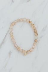 Wings Hawaii Sunstone stretchy beaded bracelet with 14k gold-filled tag. Crystal chakra healing. Boho-chic spiritual jewelry handmade in Maui. thumbnail