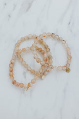 Wings Hawaii Sunstone stretchy beaded bracelet with 14k gold-filled tag. Crystal chakra healing. Boho-chic spiritual jewelry handmade in Maui. thumbnail