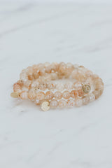 Wings Hawaii Sunstone stretchy beaded bracelet with 14k gold-filled tag. Crystal chakra healing. Boho-chic spiritual jewelry handmade in Maui. thumbnail