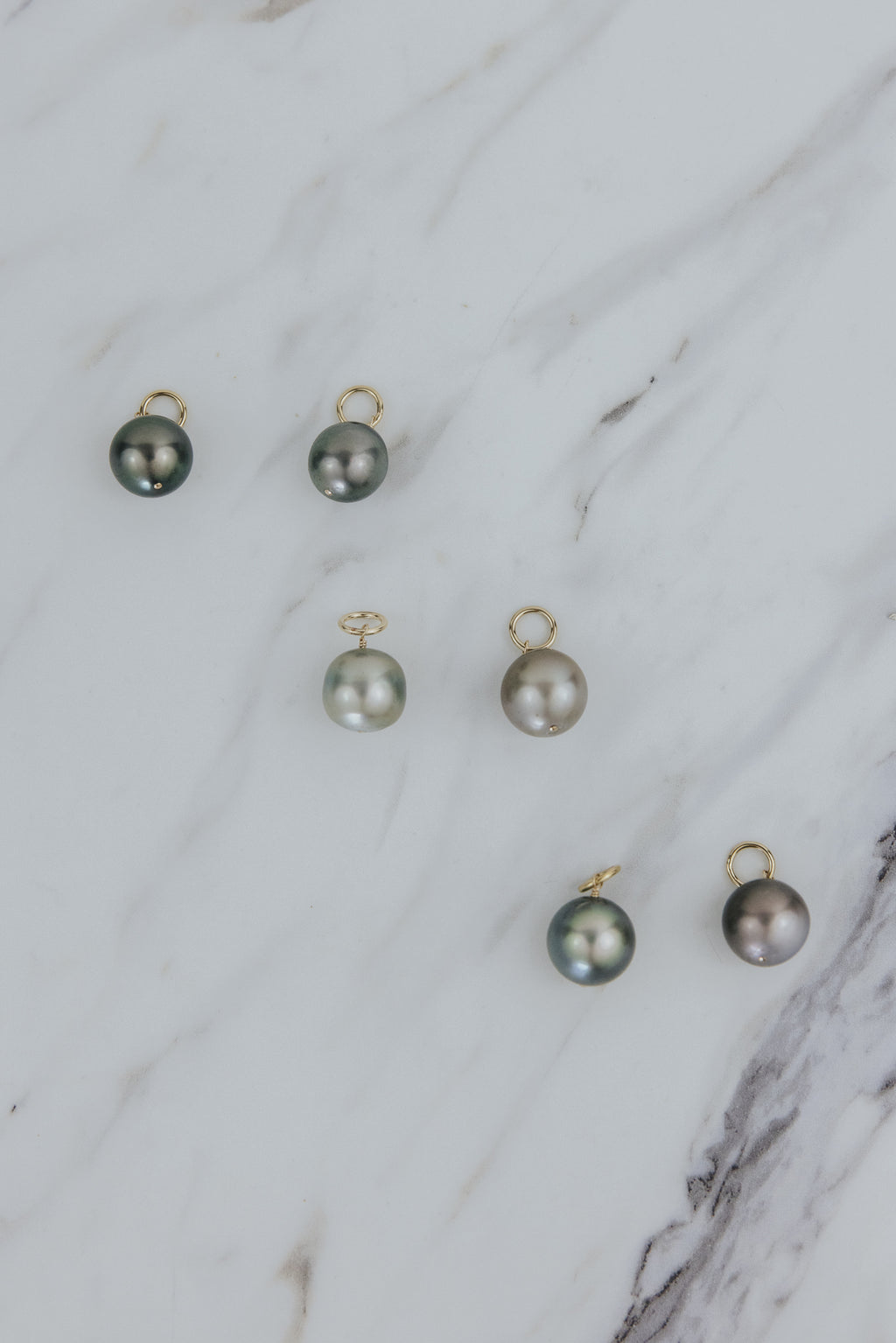 Wings Hawaii Tahitian pearl earring charms in 14k gold-filled. Keshi teardrop, silver, baroque, and round varieties. Fine jewelry handmade in Maui. 