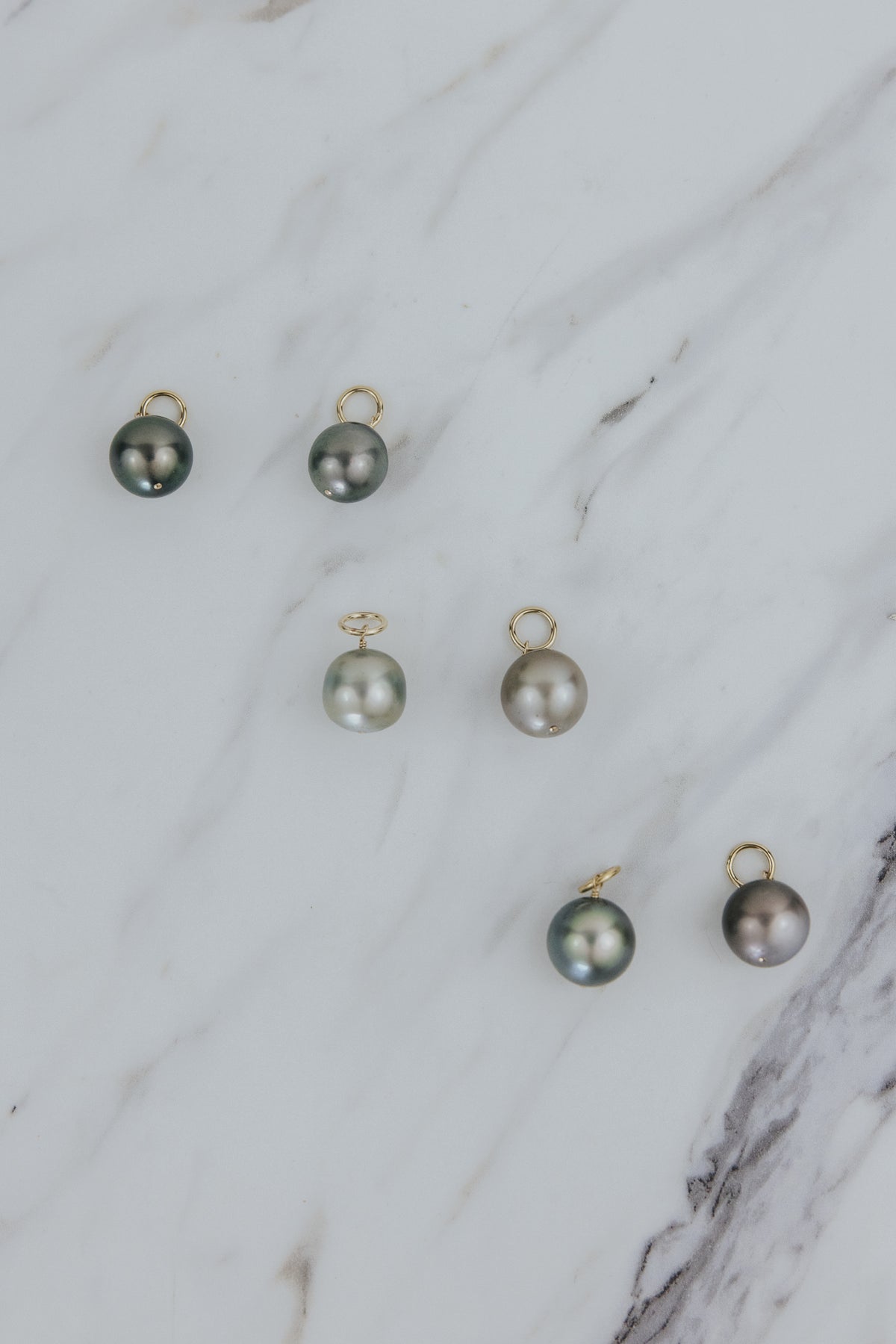 Wings Hawaii Tahitian pearl earring charms in 14k gold-filled. Keshi teardrop, silver, baroque, and round varieties. Fine jewelry handmade in Maui. 