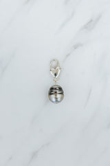Wings Hawaii Tahitian Pearl necklace charm with heart-shaped clasp in sterling silver. Fine jewelry handcrafted in Maui. Modern, beachy boho chic charm necklaces made in Hawaii thumbnail