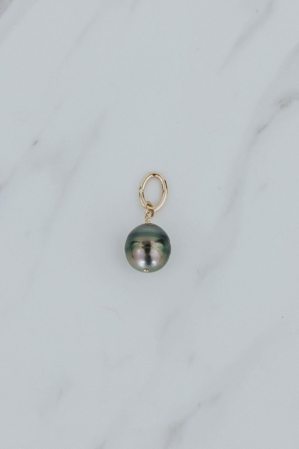 Wings Hawaii Tahitian pearl necklace charms in 14k gold-filled. Keshi teardrop, Baroque, and Round varieties. Fine jewelry handcrafted in Maui. Beach-chic charm necklaces handmade in Hawaii. 