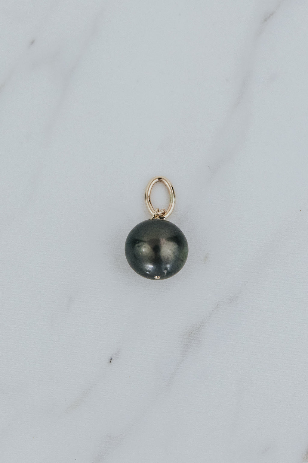 Wings Hawaii Tahitian pearl necklace charms in 14k gold-filled. Keshi teardrop, Baroque, and Round varieties. Fine jewelry handcrafted in Maui. Beach-chic charm necklaces handmade in Hawaii. 