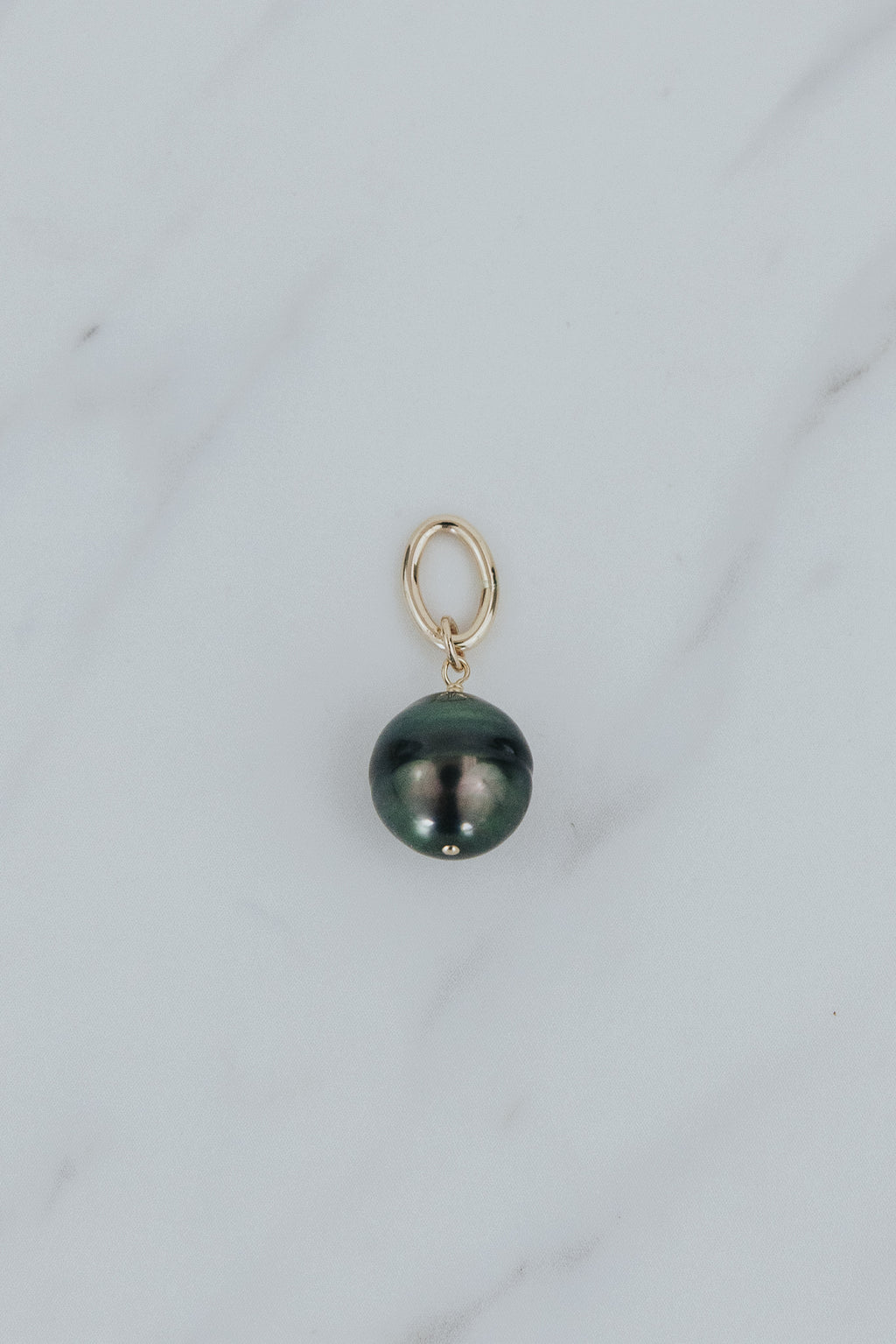 Wings Hawaii Tahitian pearl necklace charms in 14k gold-filled. Keshi teardrop, Baroque, and Round varieties. Fine jewelry handcrafted in Maui. Beach-chic charm necklaces handmade in Hawaii. 