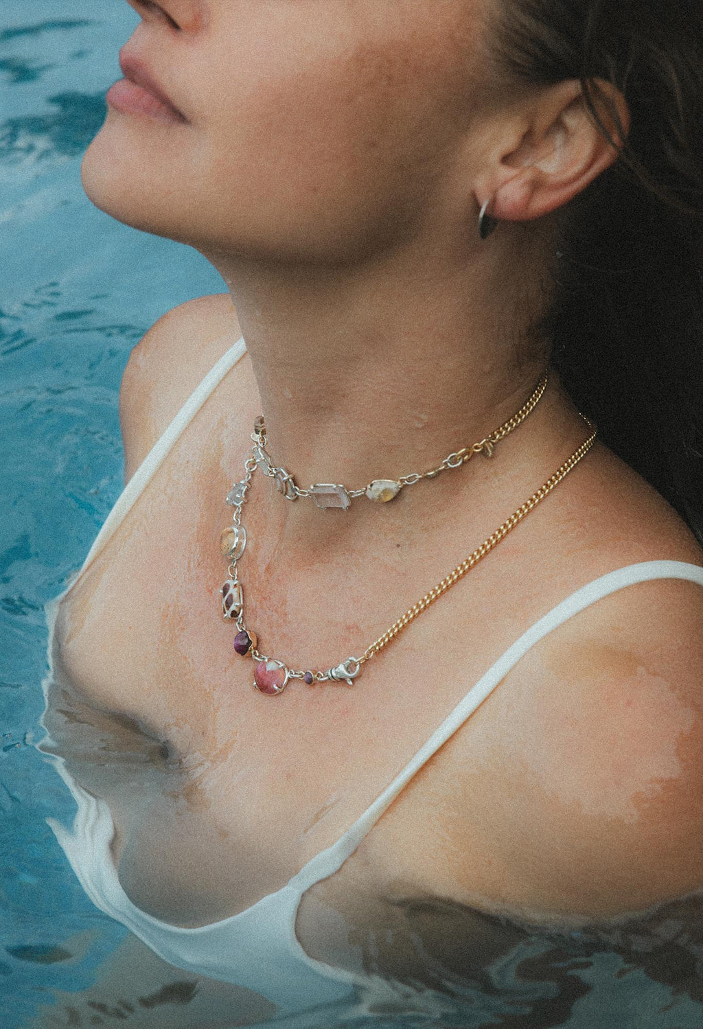 Wings Hawaii Multi Charm Talisman Necklace Extender with Australian Opal, Kunzite, Herkimer diamonds, Moonstone, and Mexican Fire Opal in mixed metals, solid 14k gold and sterling silver. Fine jewelry handcrafted in Maui. Endless custom styling possibilities. Mix and match with different length chains for chokers or longer necklaces.