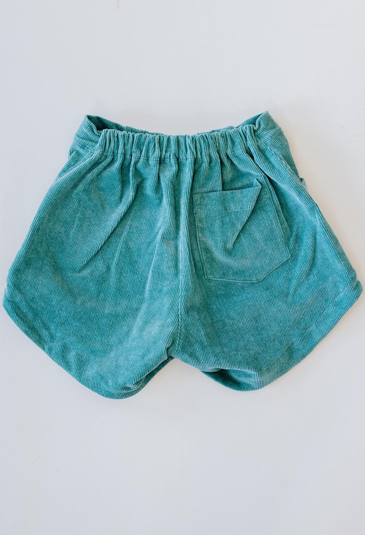Wings Hawaii retro pocket shorts in Teal corduroy. High-waisted vintage-inspired shorts. Sustainable, small batch, unique apparel designed in Maui. 