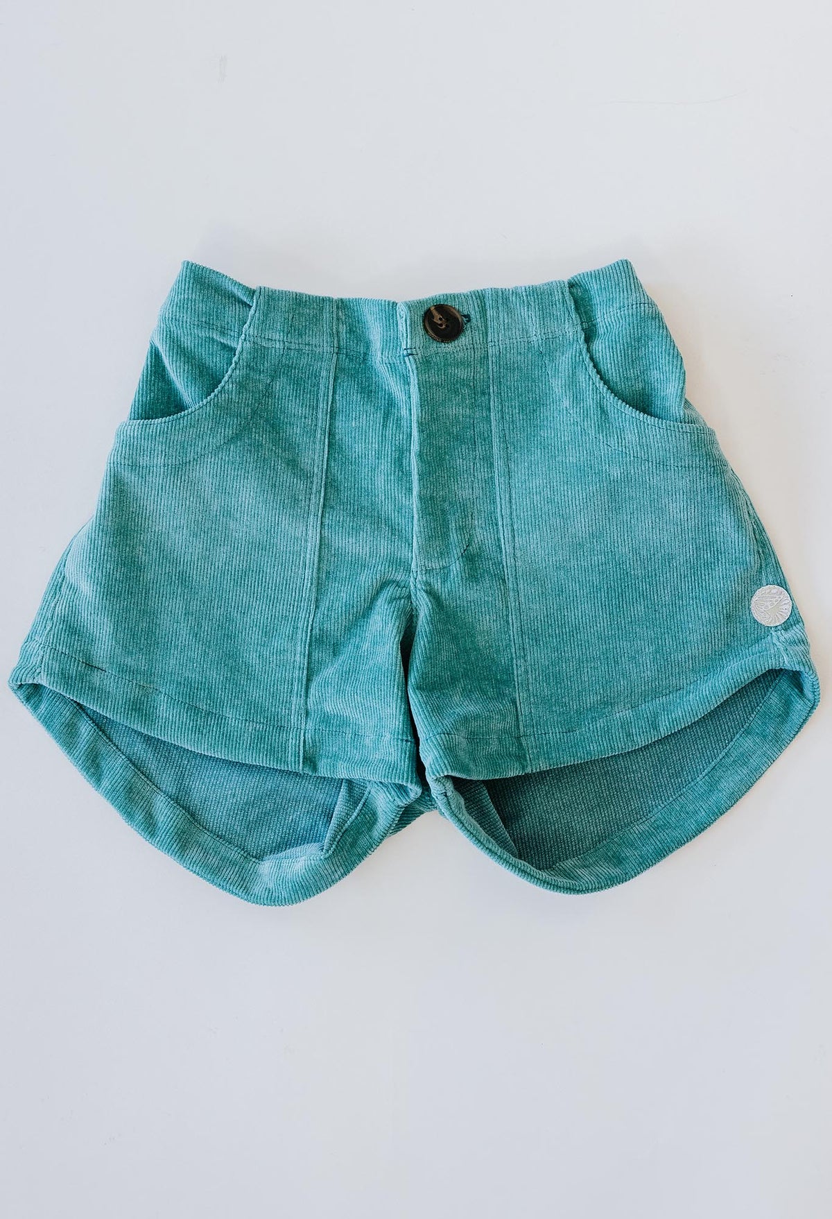 Wings Hawaii retro pocket shorts in Teal corduroy. High-waisted vintage-inspired shorts. Sustainable, small batch, unique apparel designed in Maui. 