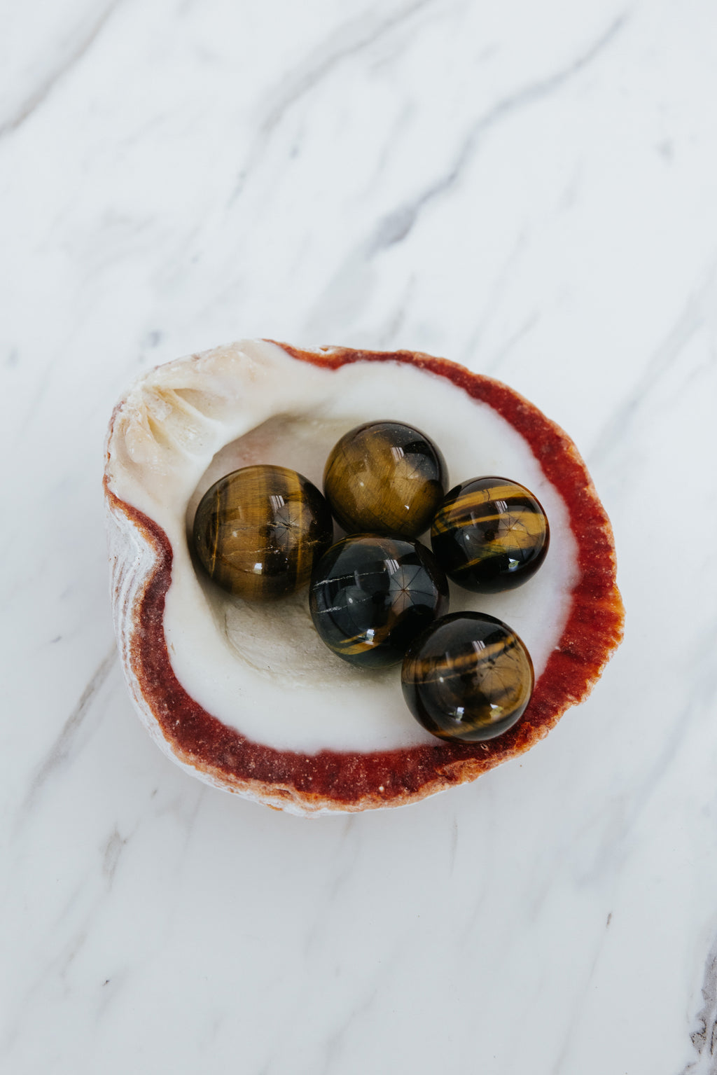 Wings Hawaii tigers eye gemstone crystal spheres. Mystical home decor and great gifts from Maui. 