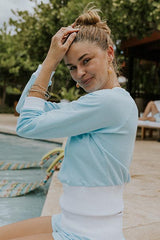Model wearing Wings Hawaii Tiger raglan sweatshirt and blue french terry pau hana shorts. thumbnail