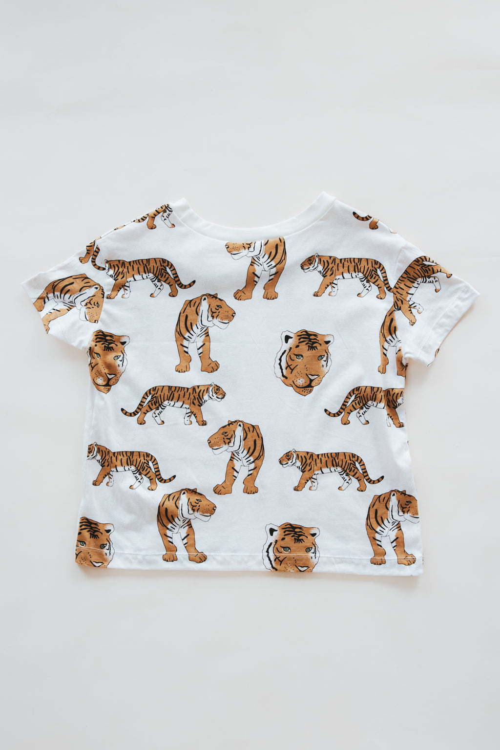 Wings Hawaii women's tiger print tee in hemp. Small batch, sustainable, eco-conscious clothing. Original artwork by Wings Hawaii designed in Maui, sewn in Bali. 