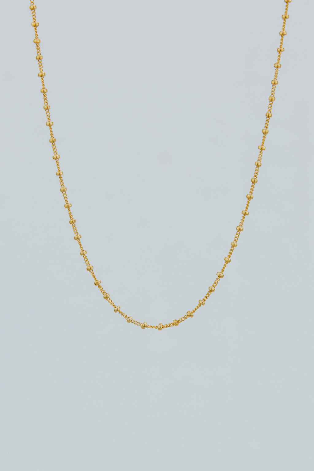 Wings Hawaii tiny satellite chain necklace in 14k gold-filled. Fine jewelry handcrafted with aloha in Maui. Wear solo, layered, or add charms to customize. High quality jewelry made in Hawaii. 