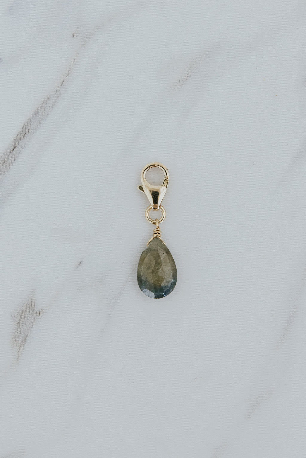Wings Hawaii Sapphire necklace charm with 14k gold-filled clasp. Fine jewelry handcrafted in Maui. Modern, beachy boho chic charm necklaces made in Hawaii
