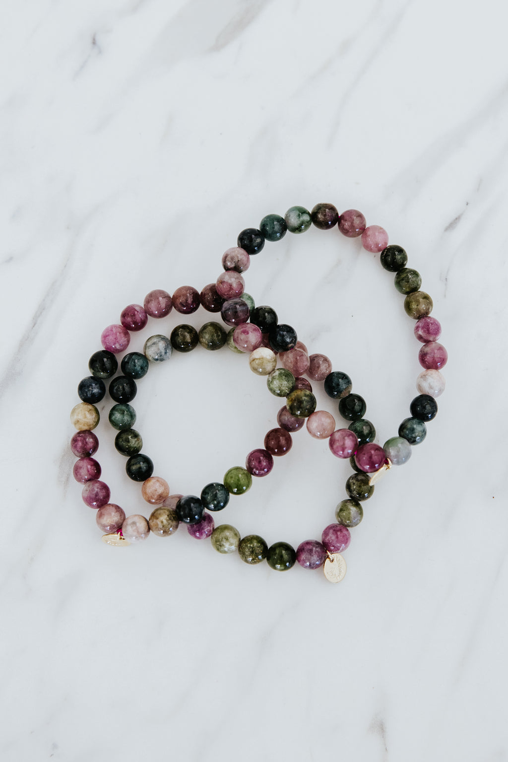 Wings Hawaii Tourmaline stretchy beaded bracelet with 14k gold-filled tag. Crystal chakra healing. Boho-chic spiritual jewelry handmade in Maui.