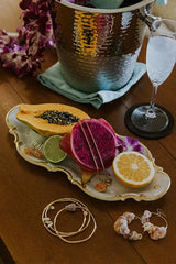 Tablescape with Reclining Mermaid Jewelry Tray and various Wings Hawaii jewelry thumbnail