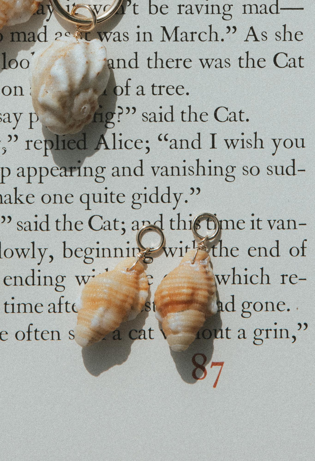Wings Hawaii Triton shell earring charms in 14k gold-filled or sterling silver. Authentic Hawaiian shells for hoop earrings. Fine jewelry handmade in Maui. 