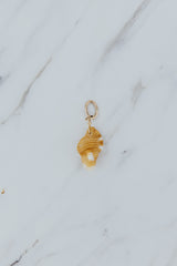 Wings Hawaii authentic Hawaiian Triton Shell necklace charm in 14k gold-filled. Beachy boho chic shell jewelry handmade with aloha in Maui. 
